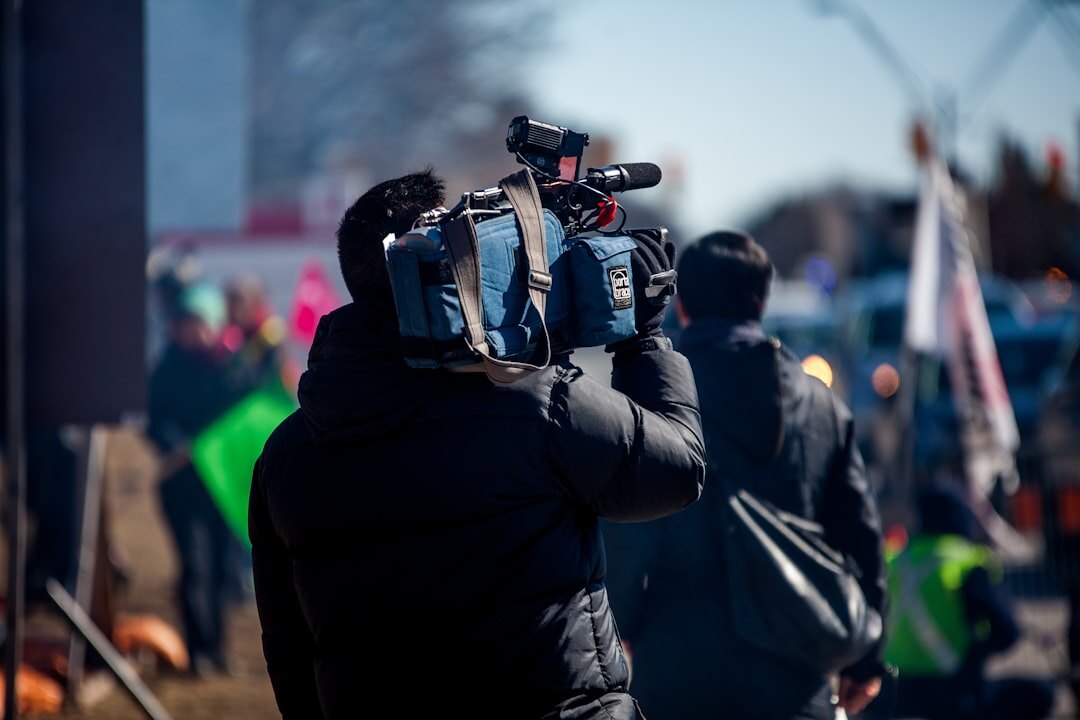 Camera operator filming a live television broadcast