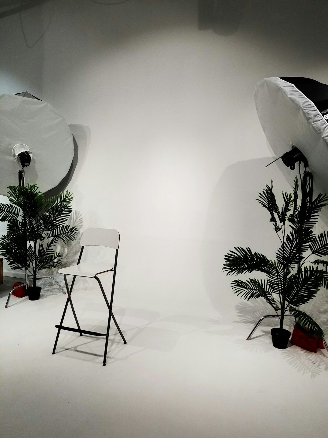 Overhead studio lighting grid with softboxes and spotlights